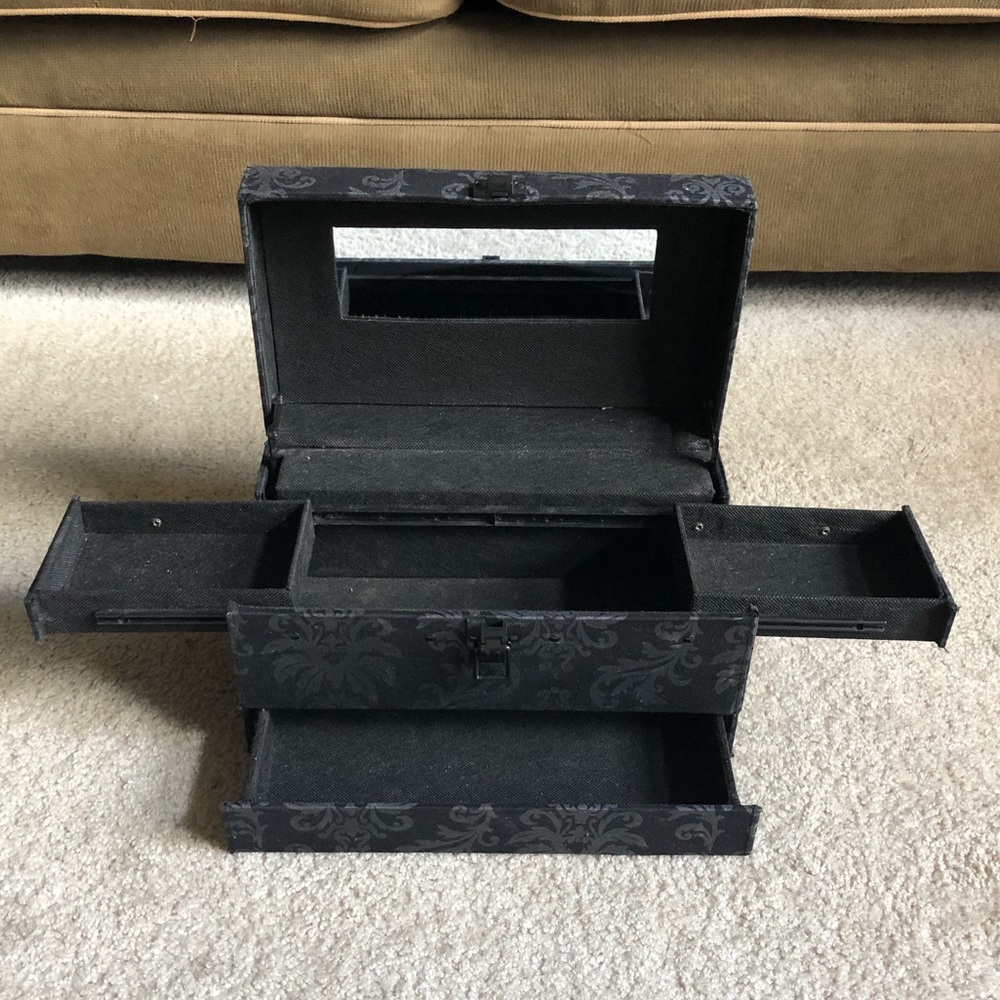 black makeup container